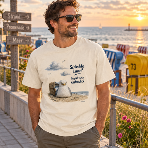 Mann im Schlechte Laune Küstenblick Bio-Heavy T-Shirt auf der Promenade